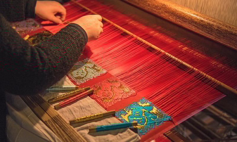 Visit a silk-spinning factory in Suzhou, China.