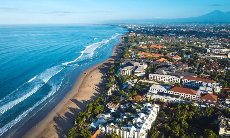 Fly to Denpasar, Indonesia, to enjoy Bali's beaches and vibrant nightlife on an overnight stay.