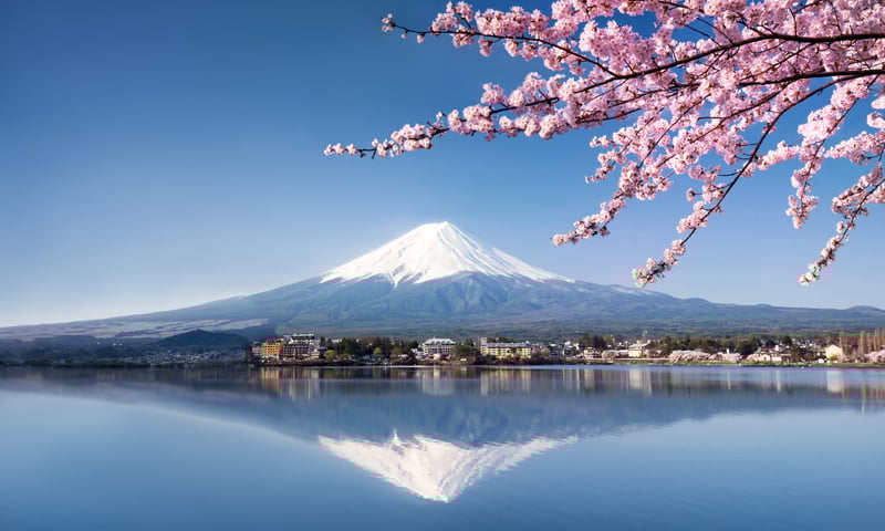 Take a moment to reflect on the serene beauty of Mount Fuji from Lake Kawaguchiko.