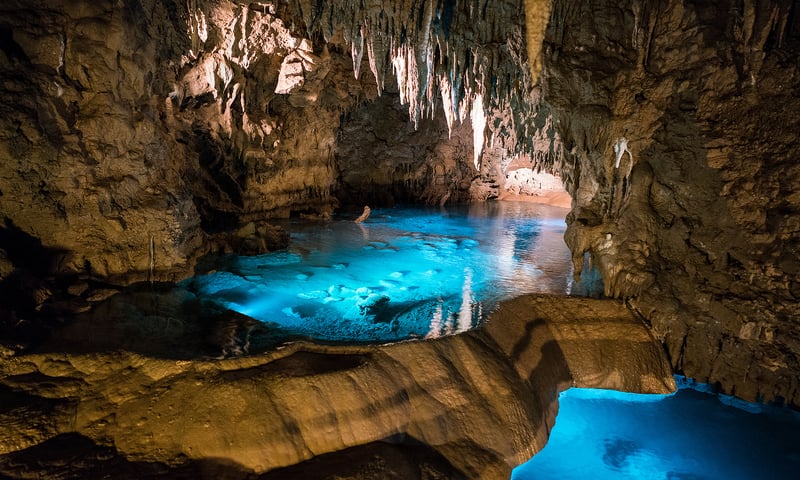 Explore Gyokusendo Cave's spectacular stalactites and stalagmites in Okinawa.