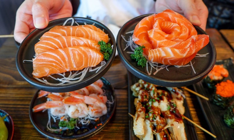 Tempt your tastebuds with fresh sashimi, sushi and grilled seafood skewers while in Okinawa, Japan.