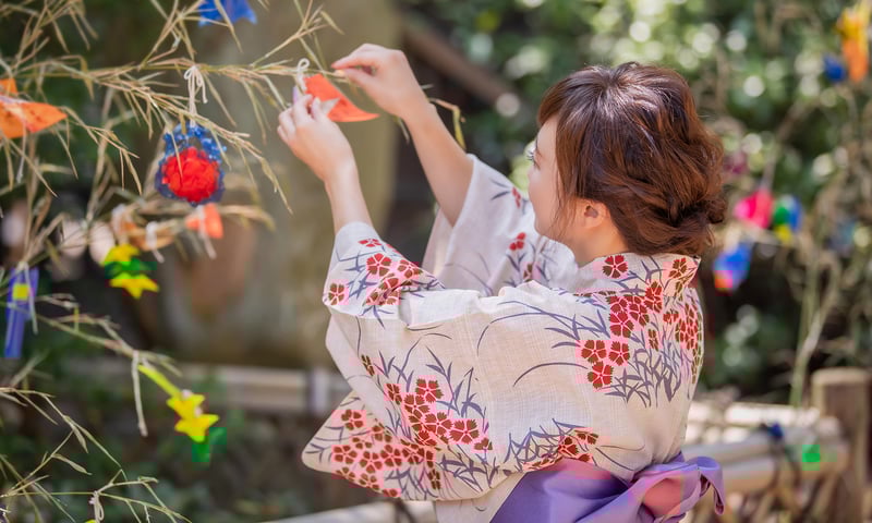 Write your own wish during Sendai's Tanabata Festival.