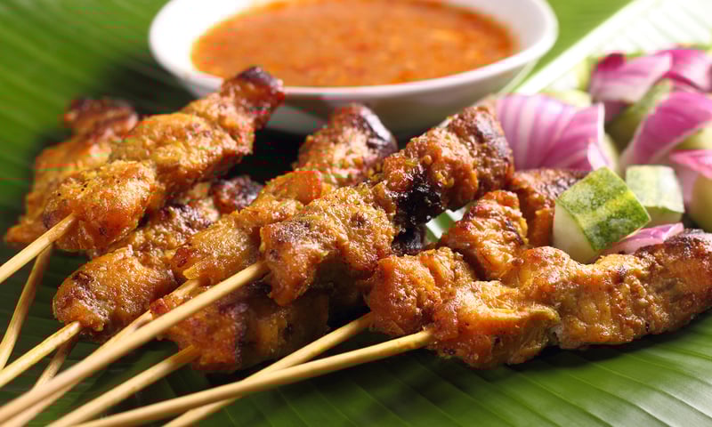 Enjoy some traditional street food in Singapore.