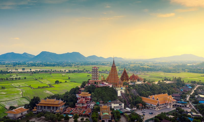 The Thai town of Kanchanaburi is located near the stunning Wat Tham Sua temples.
