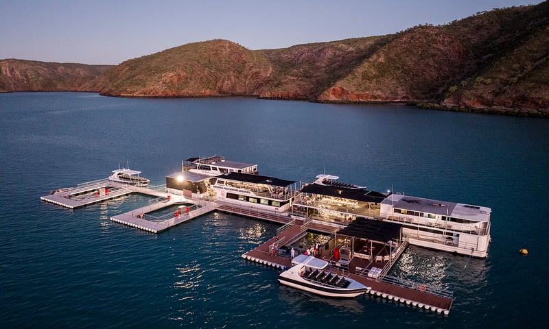 Enjoy sunset drinks on the deck of the unique Floating Pontoon Hotel, Talbot Bay.