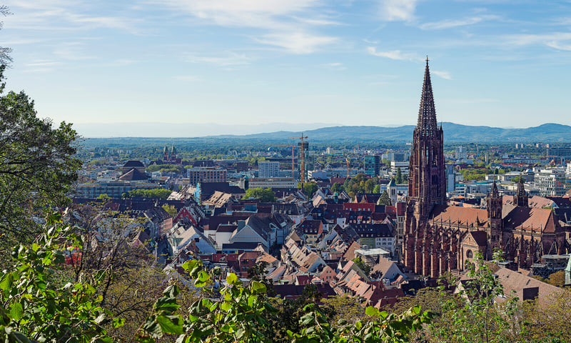 Historic Freiburg im Breisgau sits on the edge of the mountainous Black Forest in southern Germany.