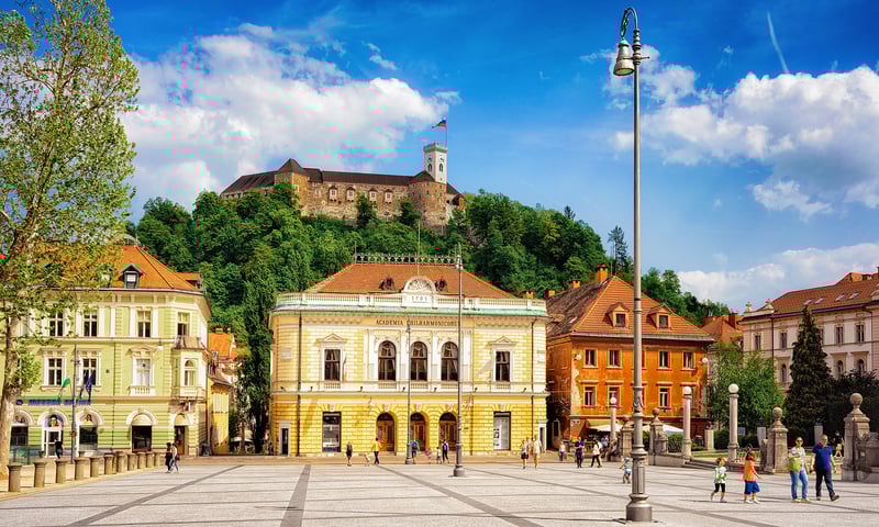 The impressive Ljublijana Castle overlooks Congress Square in Ljubljana, Slovenia.