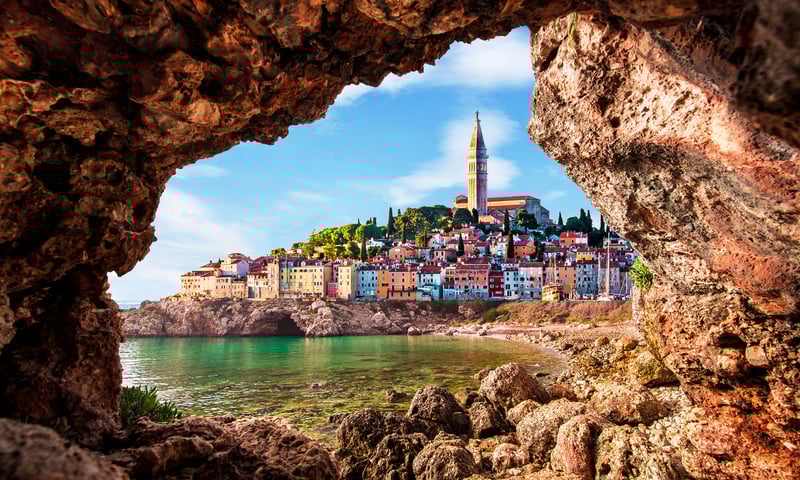 Old clock tower in Piran, seen from the coast, Slovenia (Itinerary 2 only).