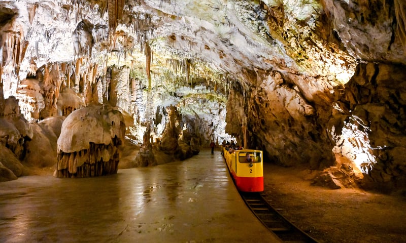 Postojna Cave is a 24.34 km long karst cave system near Postojna, Slovenia (Optional activity).