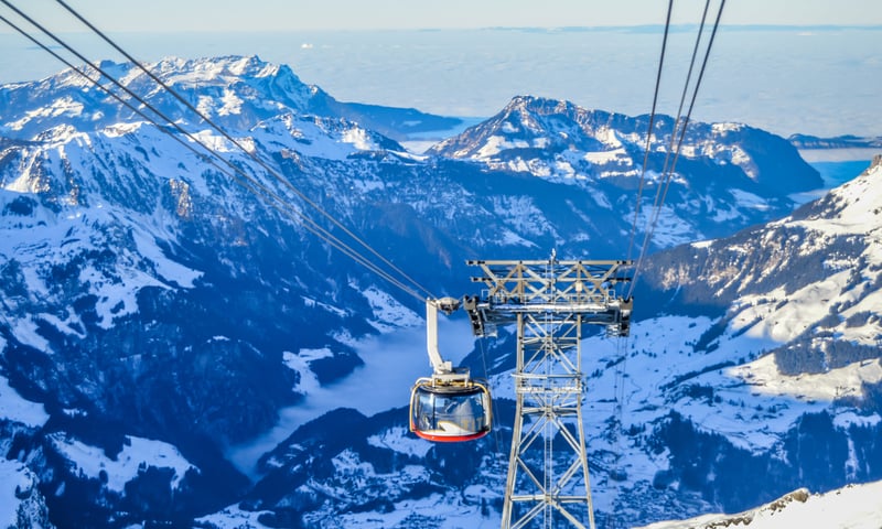Take a cable car ride to Mount Titlis, followed by a three-course lunch (optional activity).