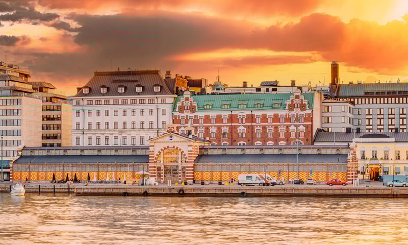 The Old Market Hall, or Vanha Kauppahalli, during a summer sunset in Helsinki, Finland.