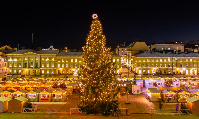 Shop for local crafts and traditional Christmas ornaments at Kauppatori markets, Helsinki, Finland.