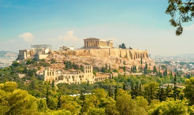 Meaning "high city", the Acropolis overlooks at the top of the city of Athens, Greece.