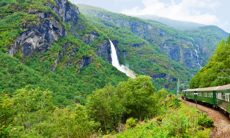 Experience a one-way Flamsbana rail trip to the town of Flam, Norway.
