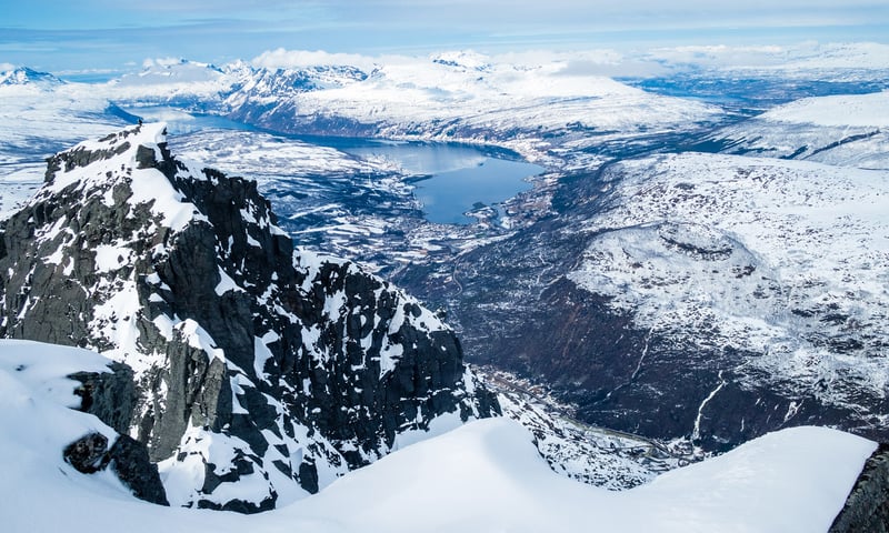 Marvel at the Arctic landscape on your train journey to Narvik, Norway.
