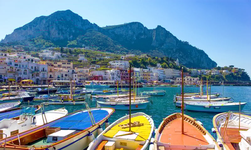 Admire the landscapes surrounding Capri, Italy.