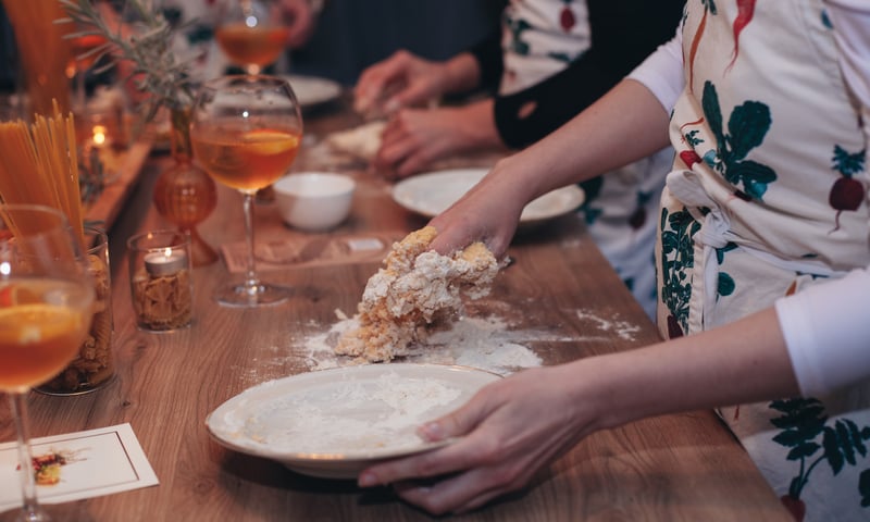 Experience an interactive Italian cooking class, then lunch and a wine tasting in San Gimignano.