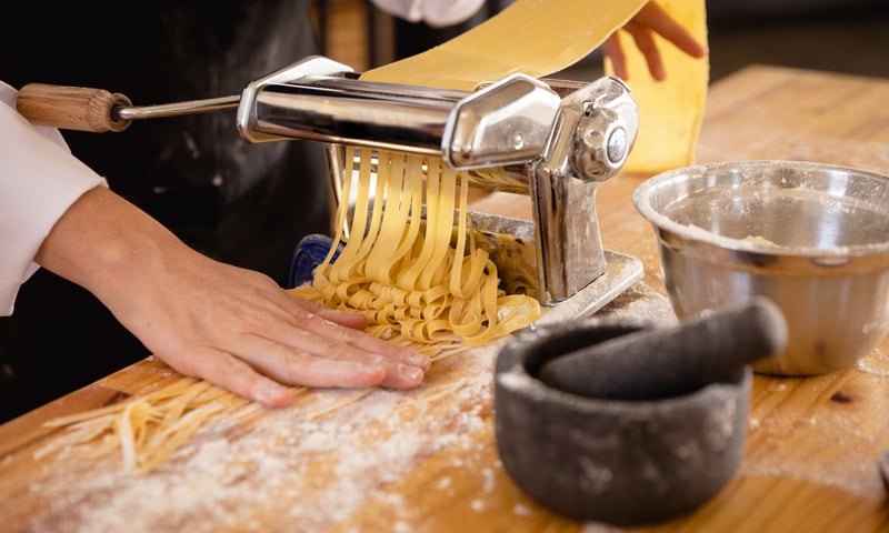 Book an optional pasta-cooking class while in Rome, Italy, charges apply.