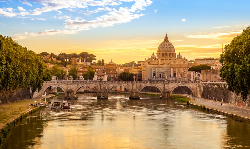 San Pietro, Saint Peter Basilica, Sant'Angelo Bridge and Tevere River in Rome, Italy.
