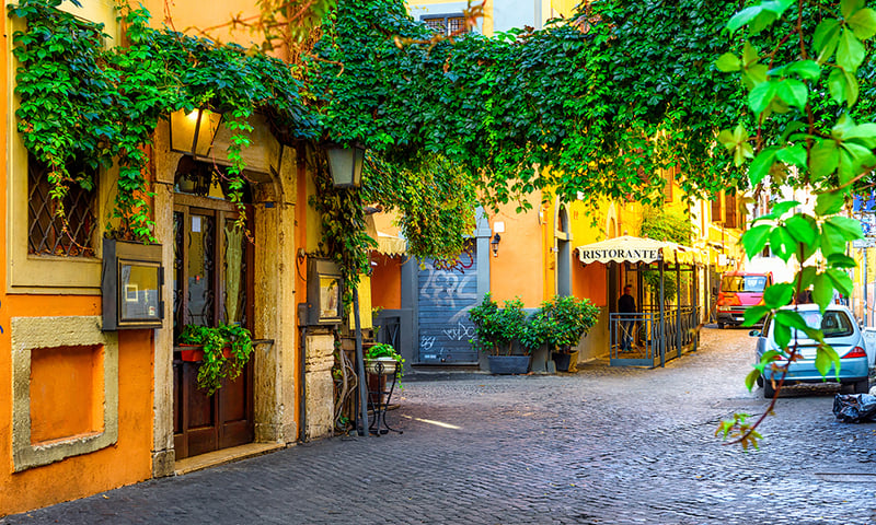 Stroll the laneways in the Trastevere neighbourhood in Rome, Italy.