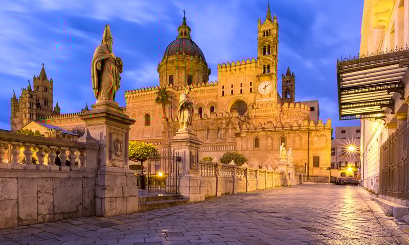 Catch an overnight ferry to Palermo, Sicily, for a guided tour of this ancient city.