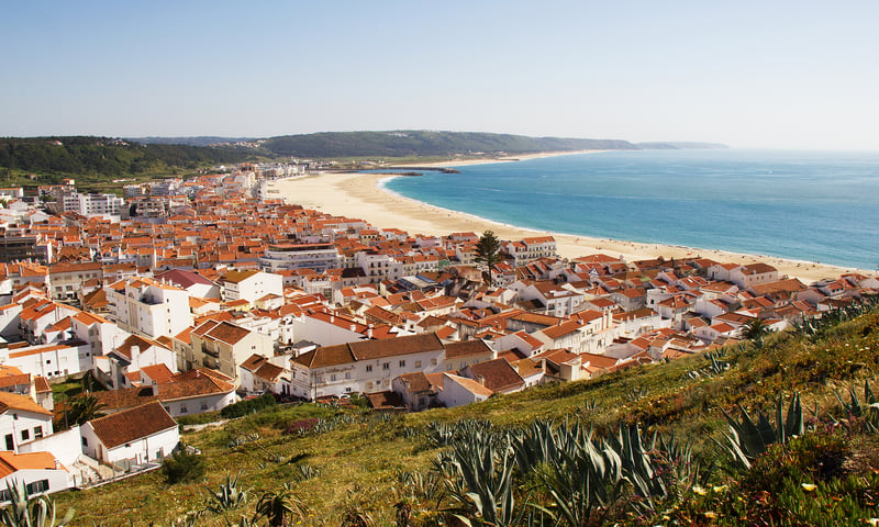 Explore the beachside Portuguese town of Nazare with its historic cliffside neighbourhood.