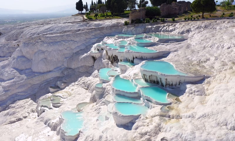 Pamukkale's thermal pools are formed by mineral-rich waters.