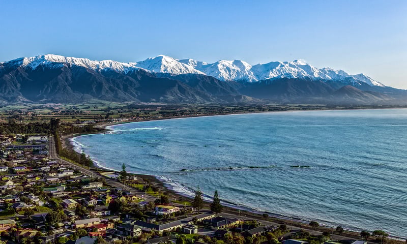 Marvel at the stunning views of the Southern Alps while docked in Kaikoura.