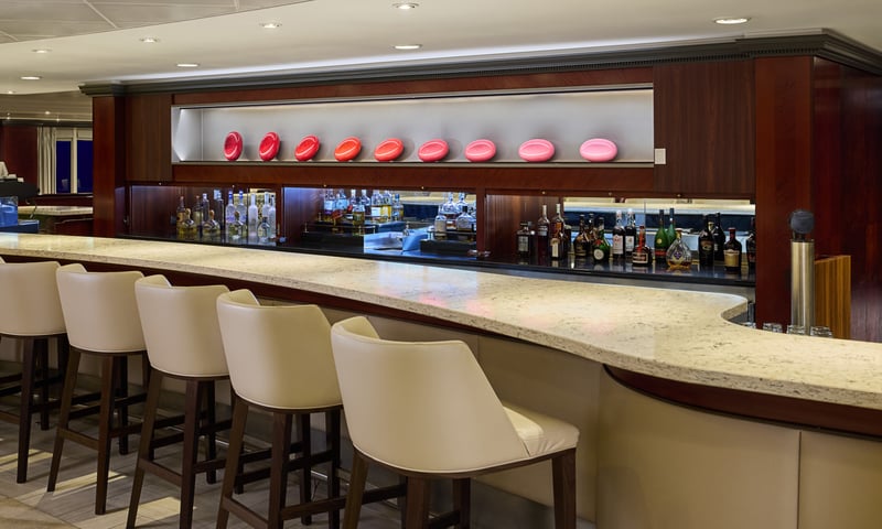 Spend some time relaxing at the Living Room Bar onboard Azamara Pursuit.