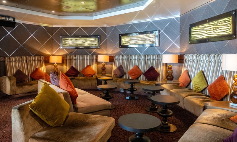 Make new friends at the Martini Lounge onboard Celestyal Journey.