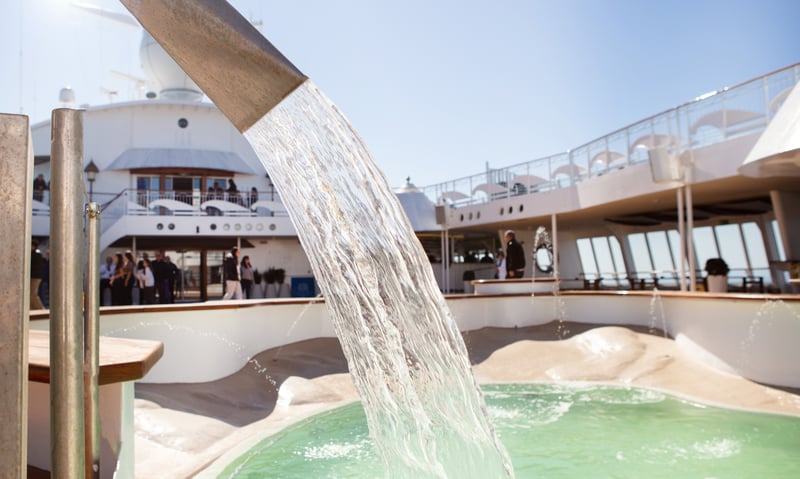 Relax by the pool onboard Celestyal Discovery.