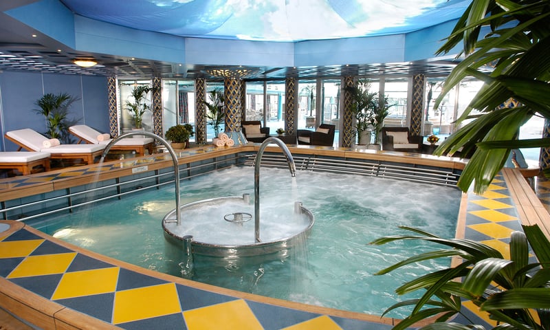 Treat yourself to a soak in the spa's hydrotherapy pool aboard Oosterdam, charges apply.