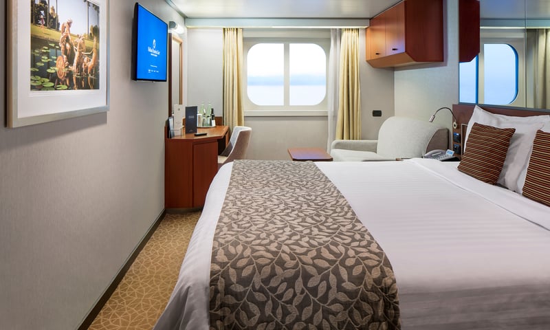 Rest easy in an upgraded OceanView cabin aboard Holland America's Westerdam or Nieuw Amsterdam.