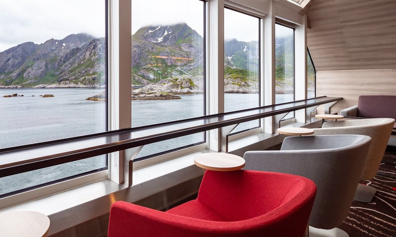 Take a quiet moment in the Explorer Lounge aboard HX Expeditions.