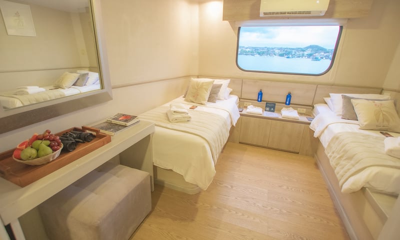 Relax in a Twin Cabin aboard the boutique MC Seaman Journey catamaran.
