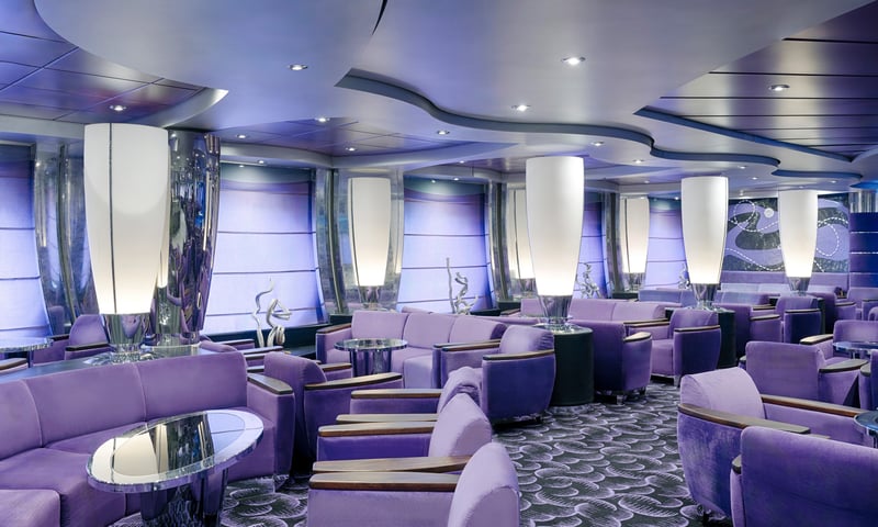 Relax and make new friends in the Onyx Lounge aboard MSC Magnifica.