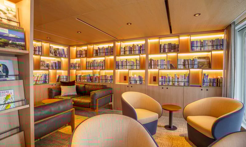Retreat to the quiet library onboard Quark Expeditions' Ultramarine.
