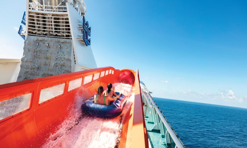 Ride a blaster waterslide high above the ocean aboard the Navigator of the Seas.