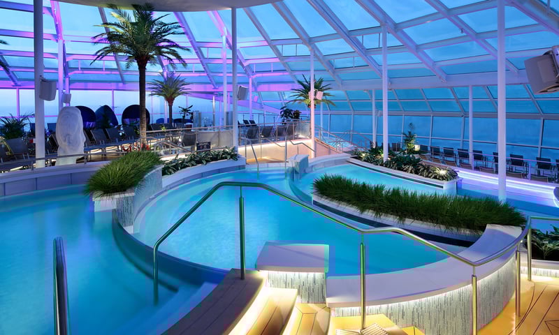 Enjoy the peaceful serenity of the adults-only solarium onboard Spectrum of the Seas.