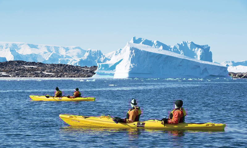 Grab a kayak to glide between Antarctica's sparkling icebergs, charges apply.