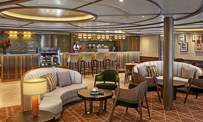 Your Seabourn cruise ship offers comfortable spaces to connect in like the Seabourn Square cafe.