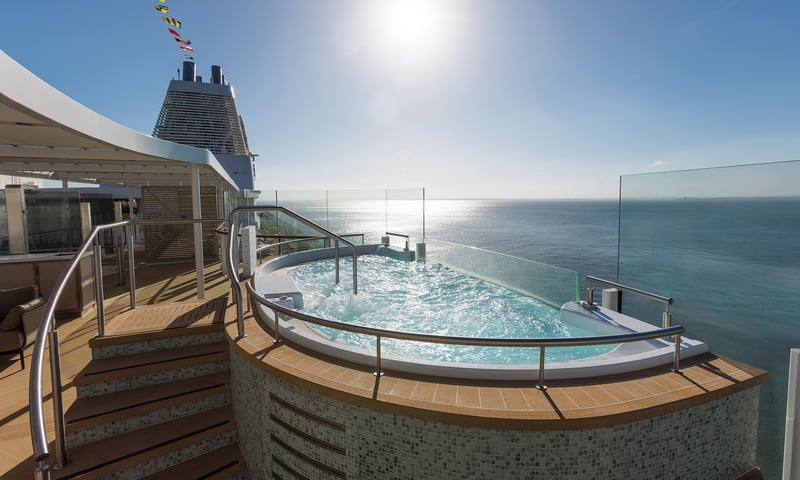 Sea days are perfect for working on your tan by the infinity pool aboard Silversea ships.
