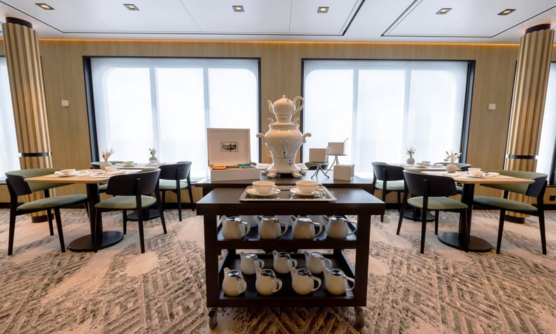 Savour tea time in the Club Lounge aboard SH Minerva.