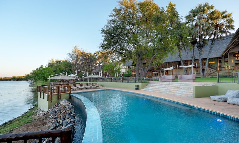 Relax after a day at Victoria Falls with a refreshing dip at the David Livingstone Safari Lodge.