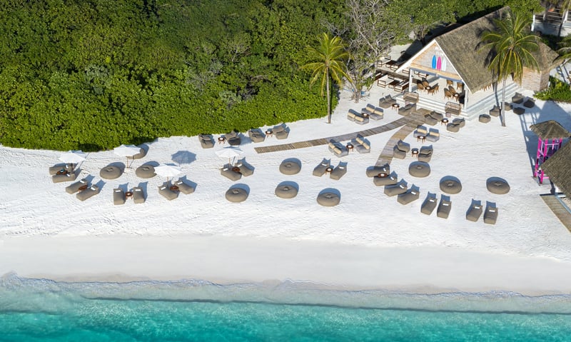 Socialise at the Beach Club, Ifuru Island Resort, Maldives.