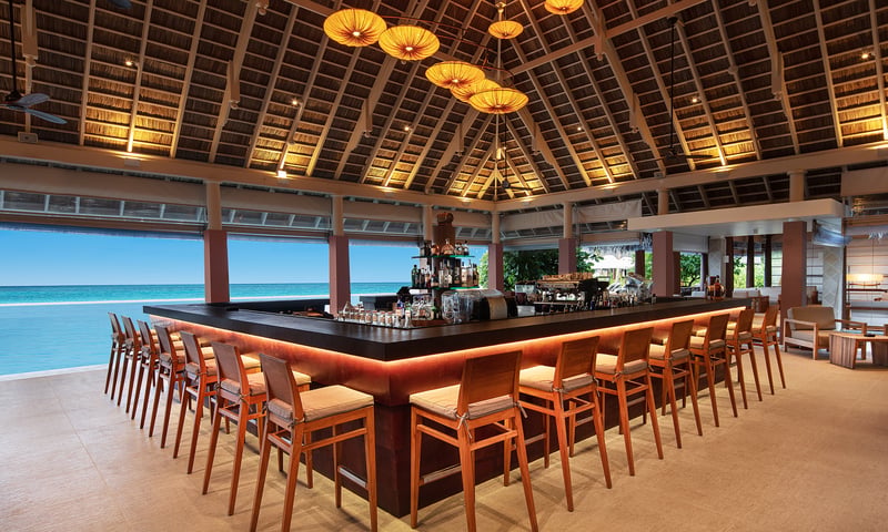 Unwind with a refreshment poolside at Bandi Bar.