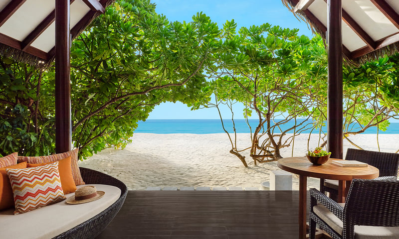 Beach Villas offer a wooden sundeck with premium sun loungers and a coffee table.