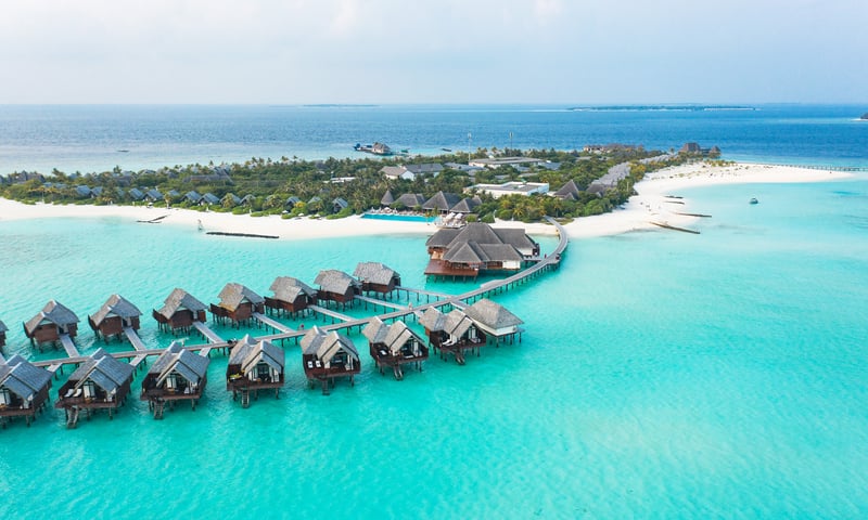 Enjoy indulgent days lounging on tropical beaches in the Maldives.