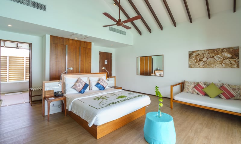 Choose to upgrade to a chic Sunset Overwater Villa.