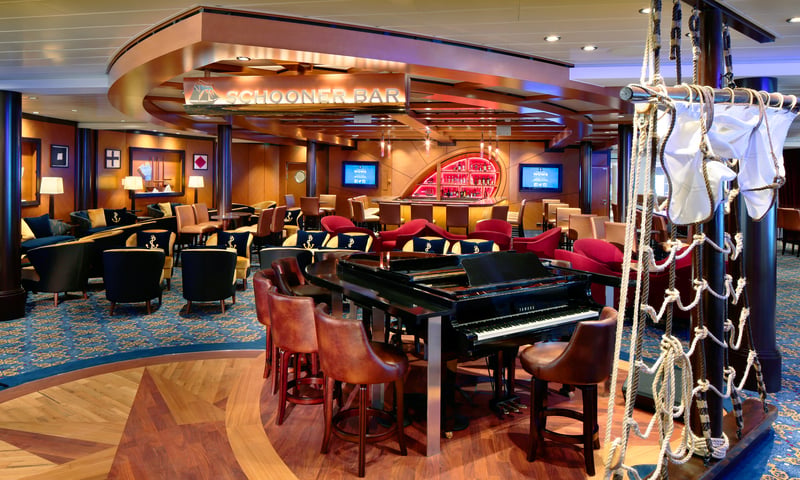 Enjoy live entertainment at the Schooner Bar aboard the Royal Caribbean ship.